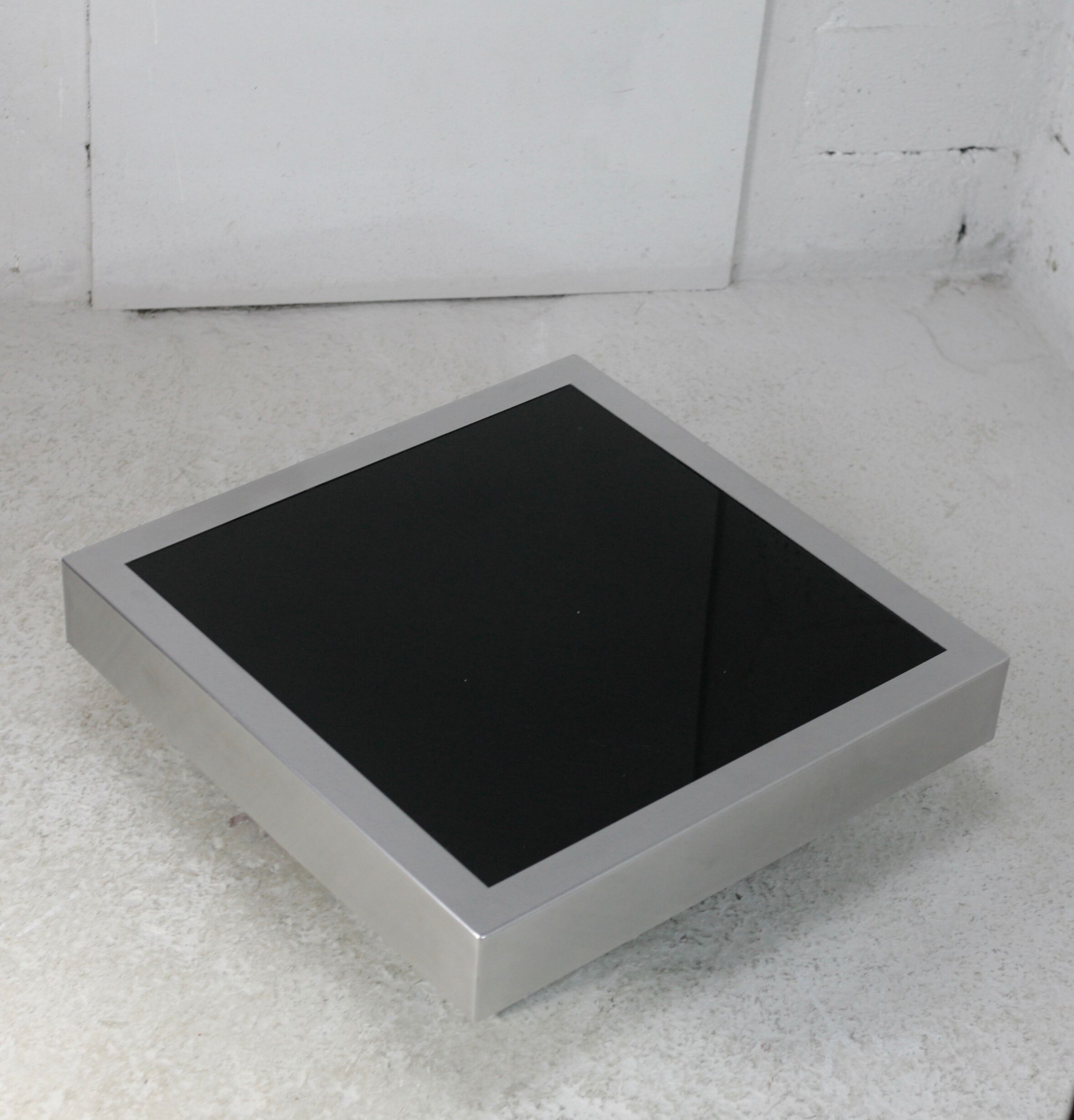 Coffee table in steel and black glass. France, circa 1970