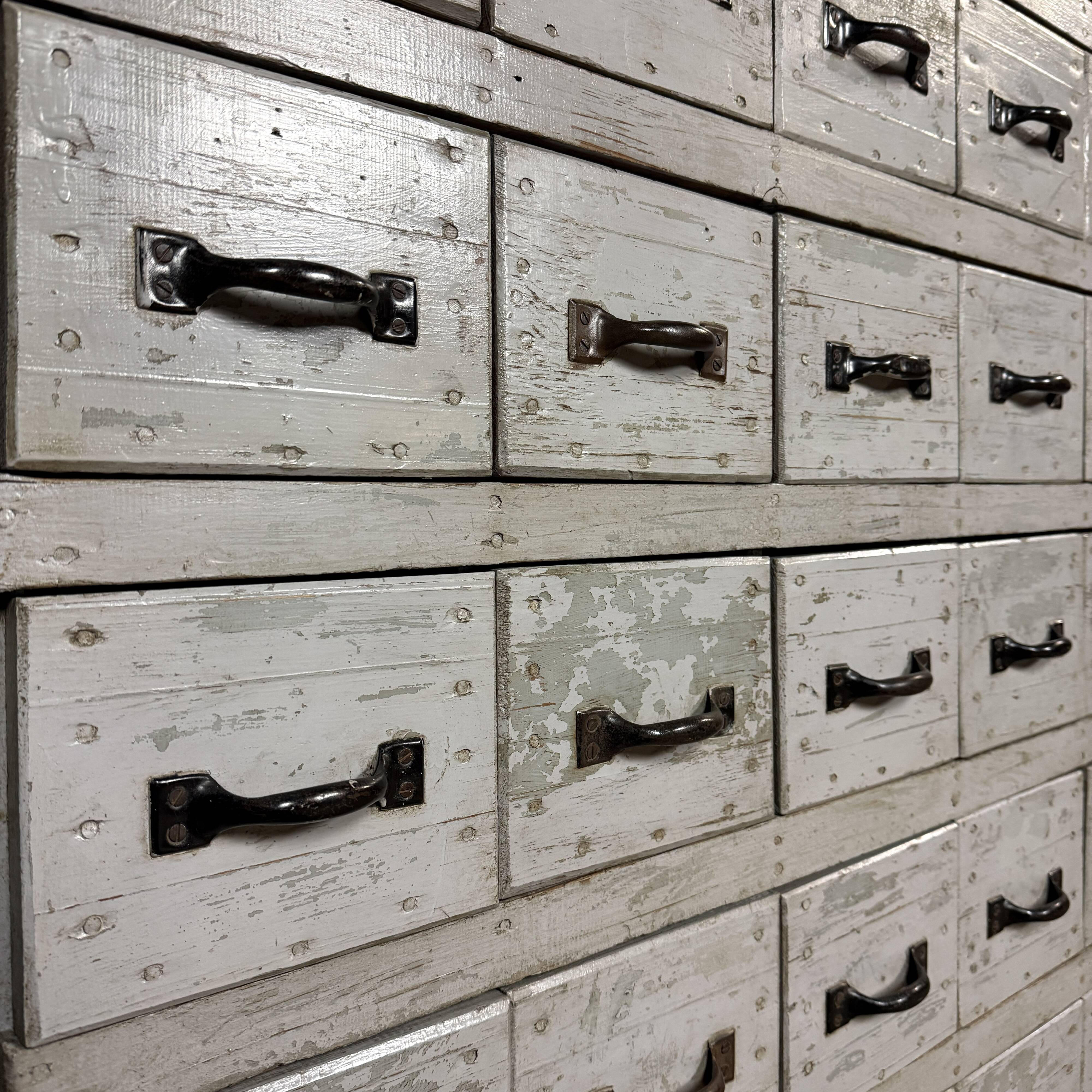 Old light grey workshop drawer cabinet with 25 drawers
