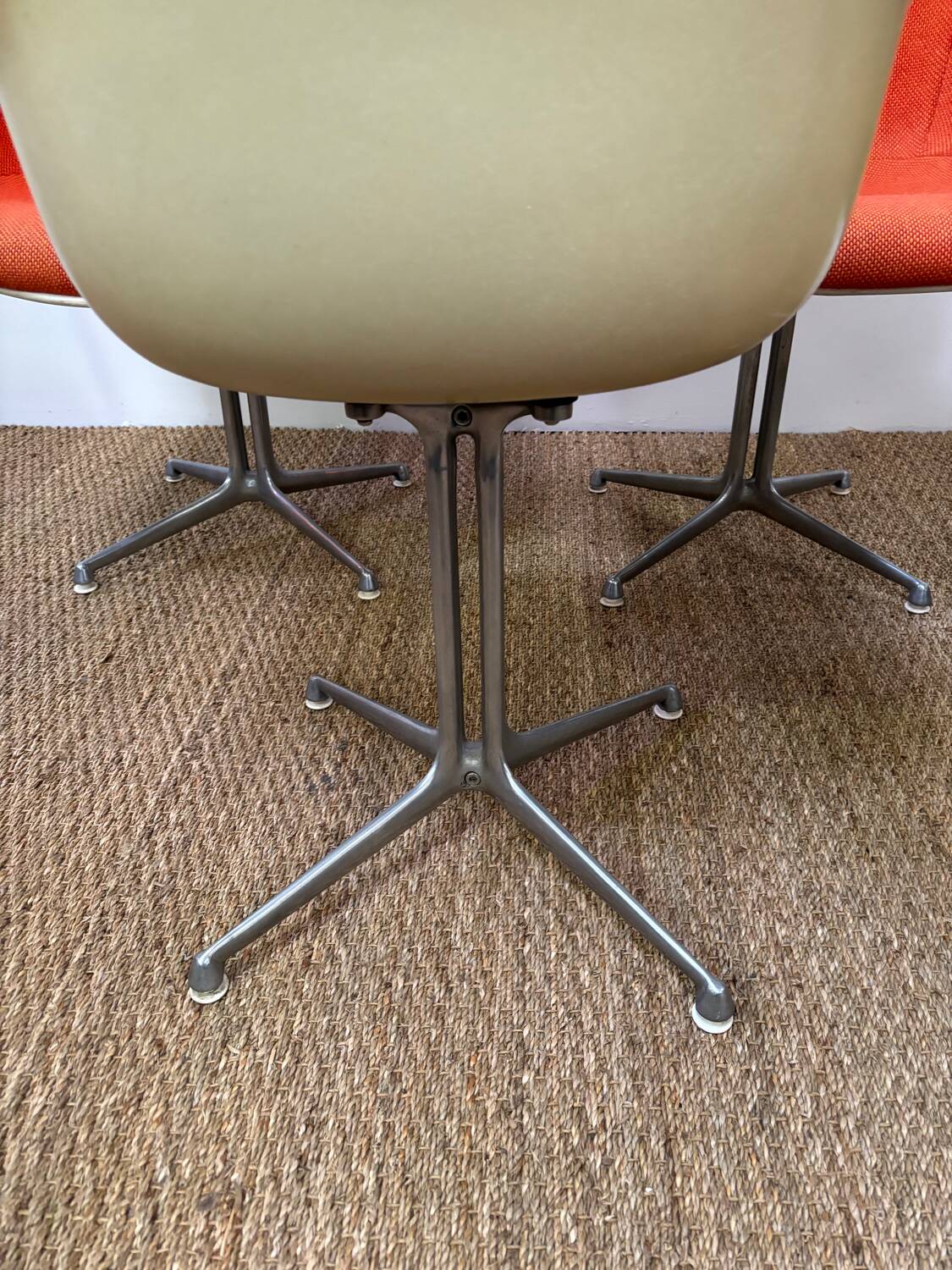 Set of 6 Eams armchairs in Hermann Miller orange fiber shell