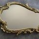 Miroir en bronze doré style rocaille 68 x 42 cm