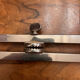 Small chrome and glass coffee table.