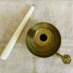 20th century chiseled brass socket candle holder representing Horsemen in armor