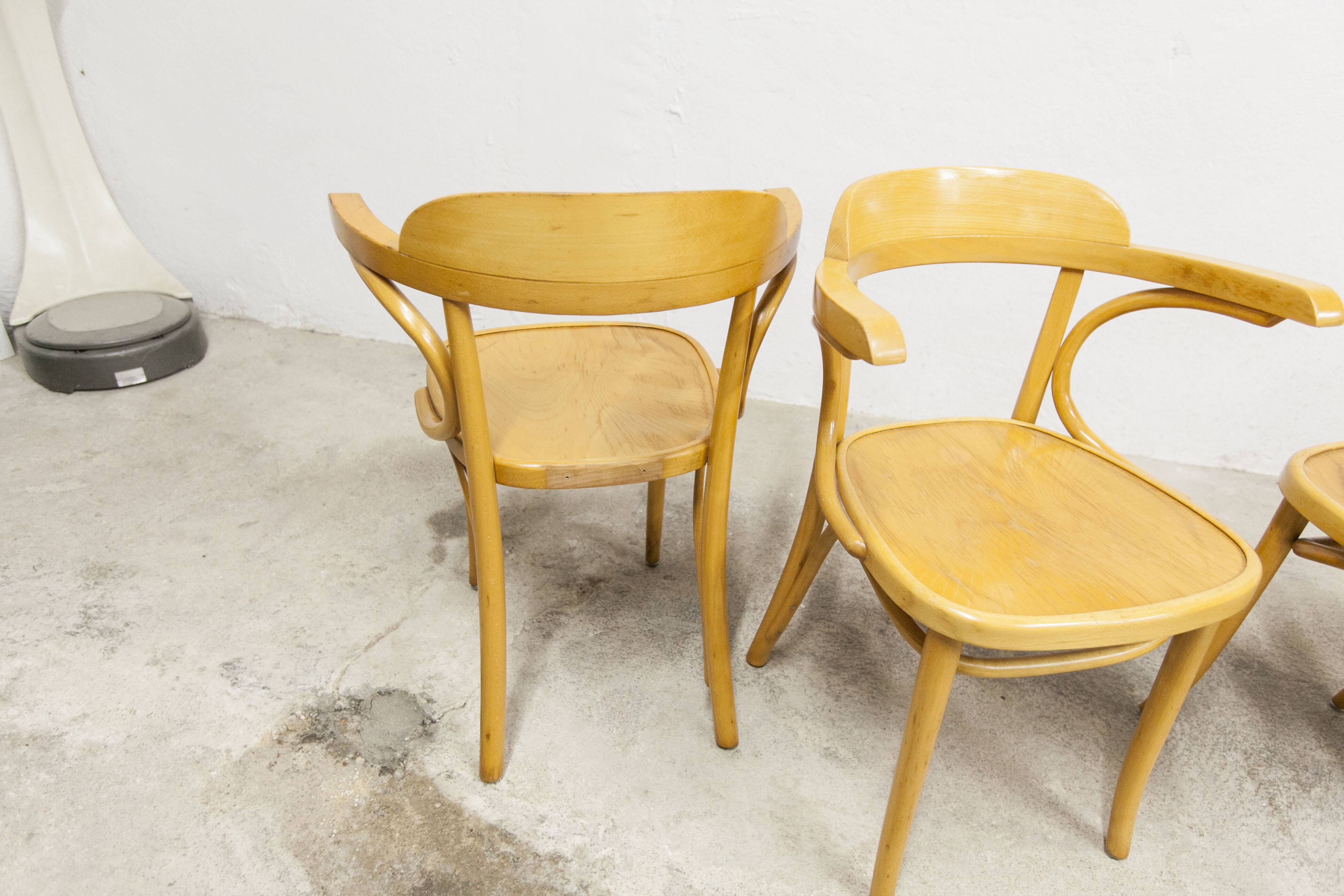 Set of 4 bistro armchairs with armrests from the 1960s.