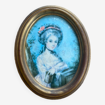 Oval frame with character