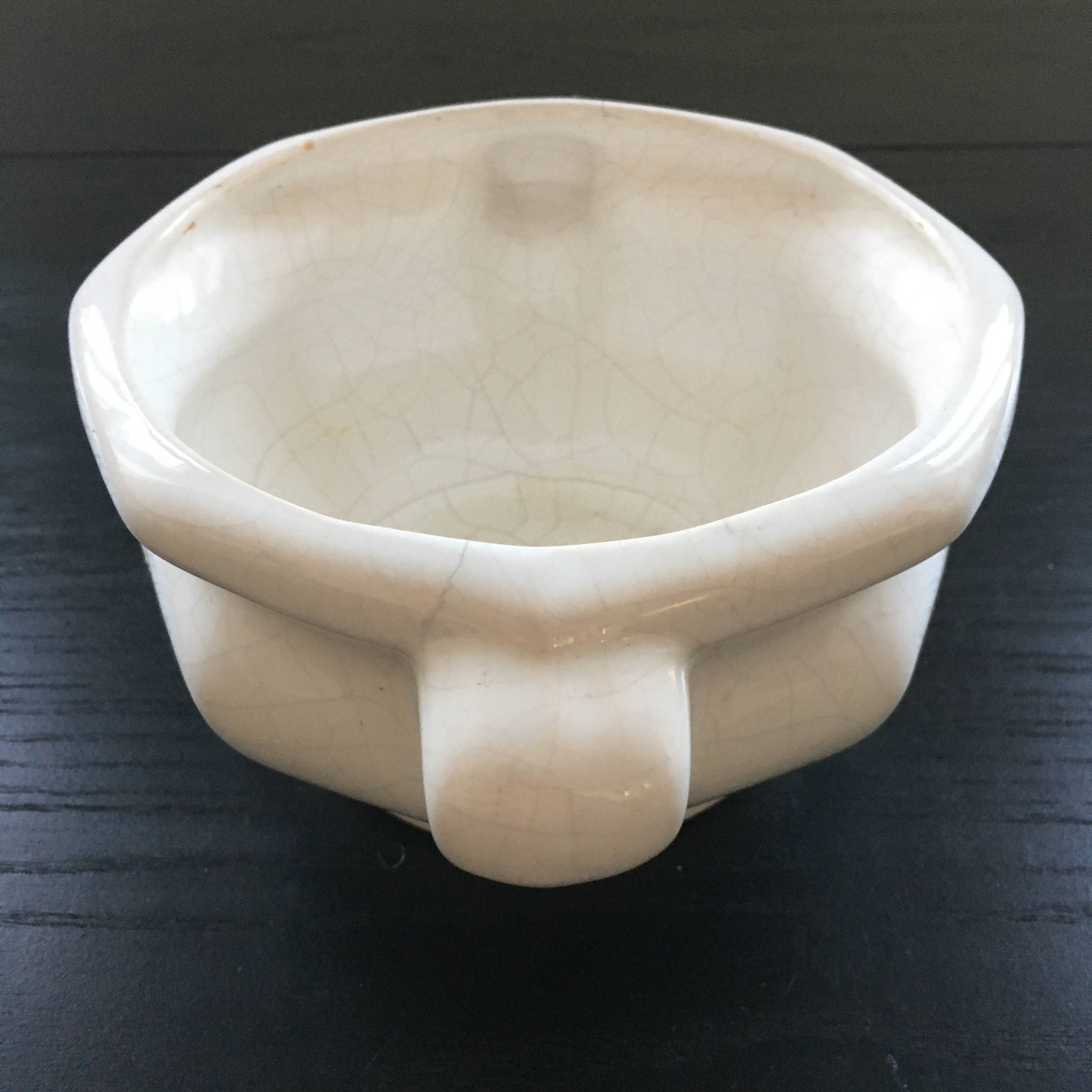 Cracked earthenware planter