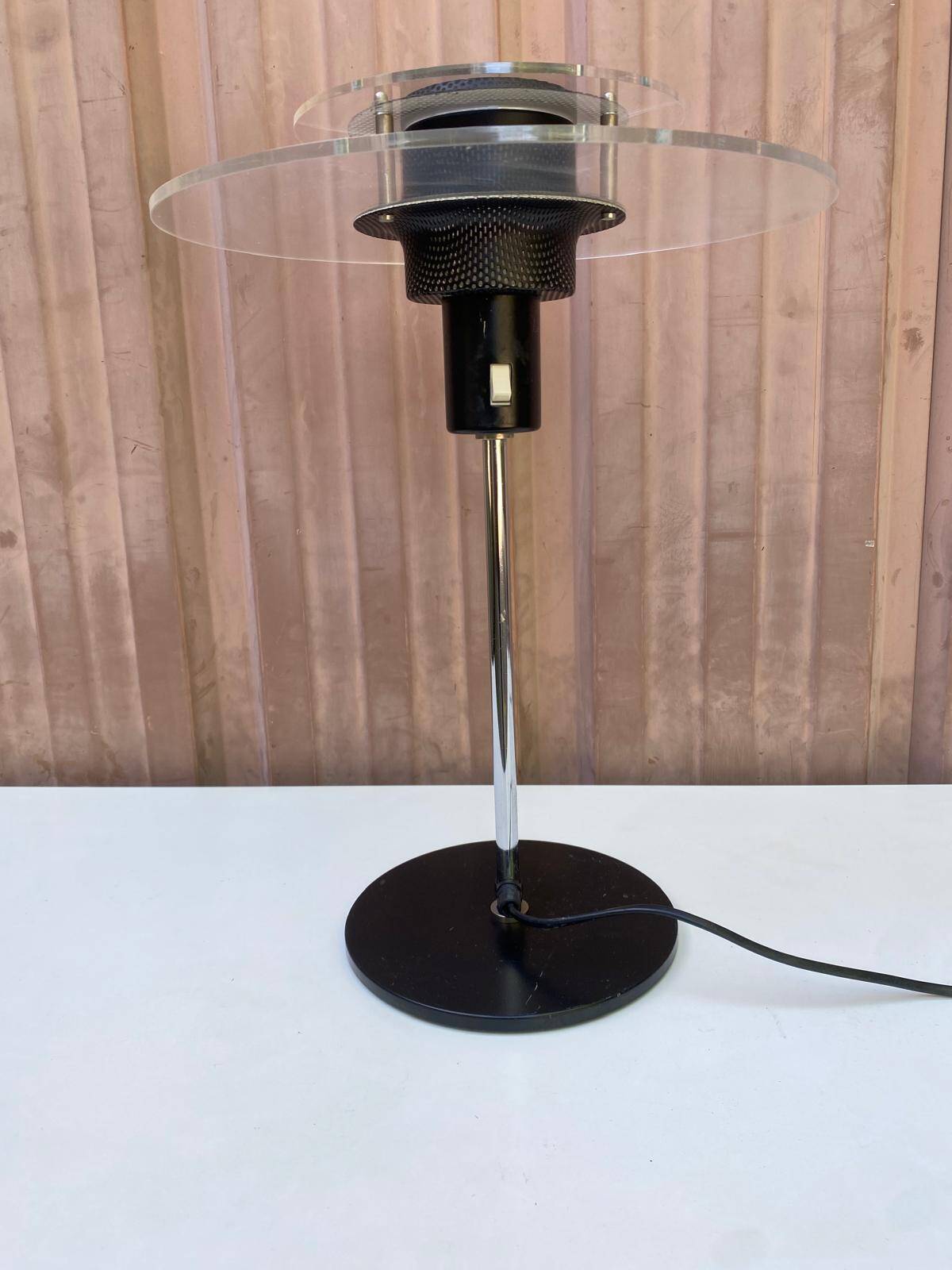 Post-modern vintage lamp in black metal and plexiglass from the 1970s.