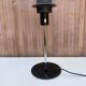 Post-modern vintage lamp in black metal and plexiglass from the 1970s.