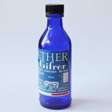 Blue glass bottle of ether
