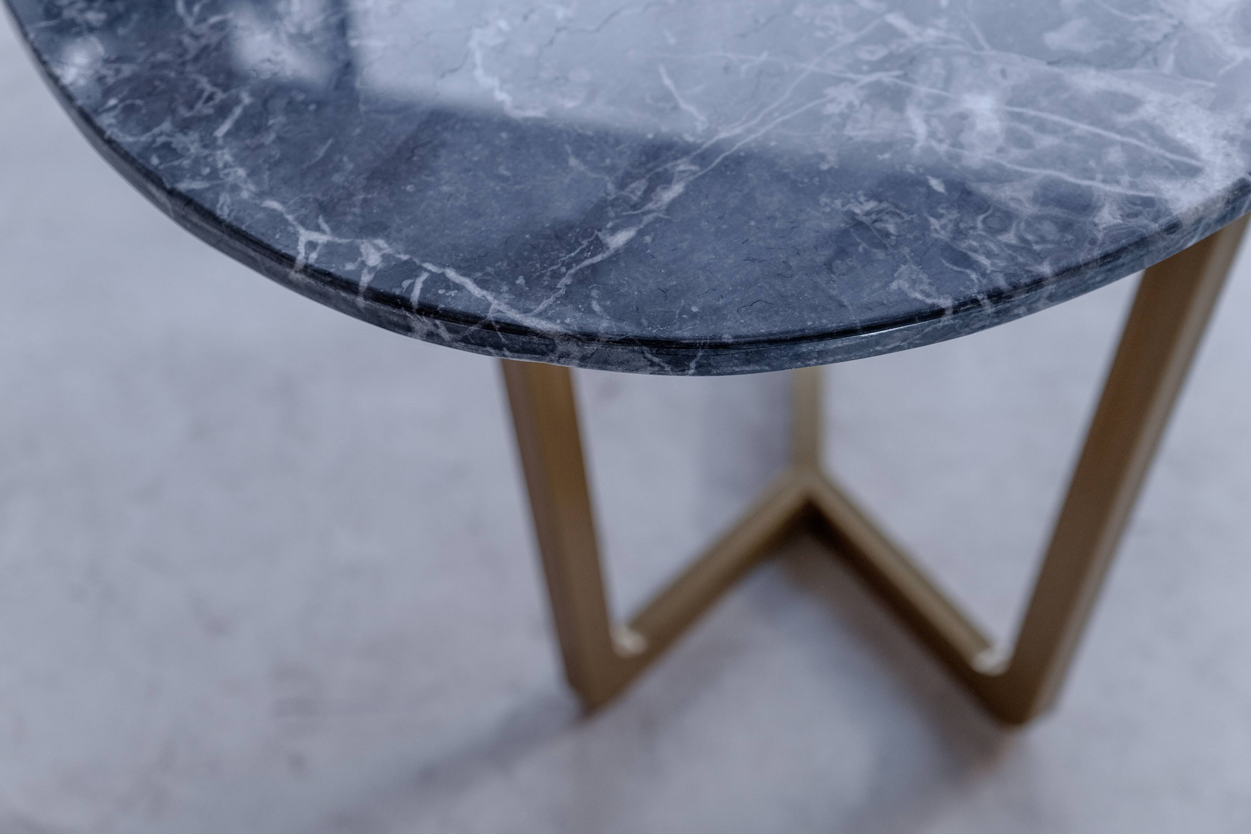 Oval dining table in grey marble Emperador