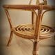 Light rattan lounge table and smoked glass