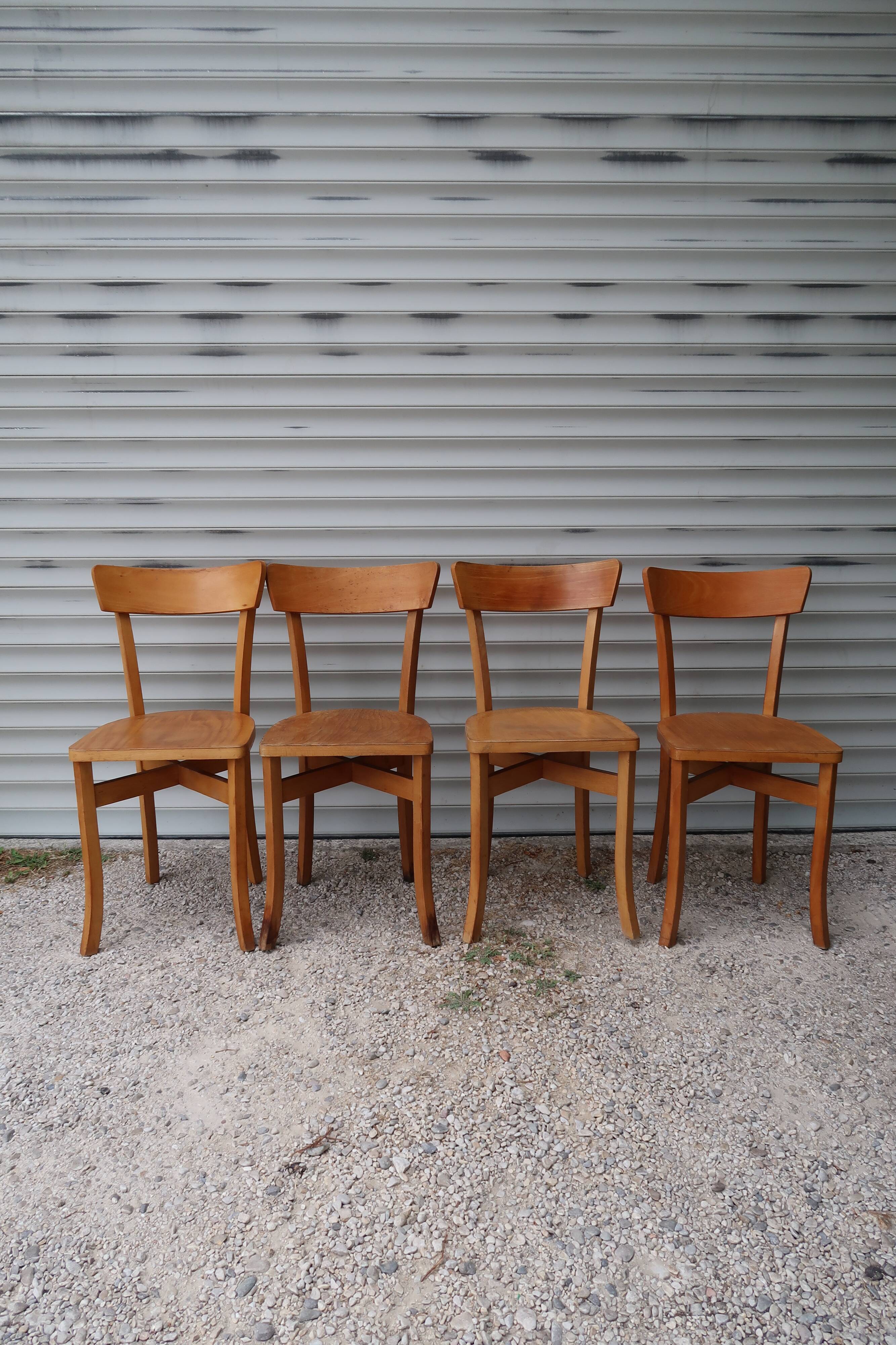 Set of 7 mismatched bistro chairs