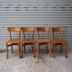 Set of 7 mismatched bistro chairs