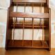 Wooden wall review holder
