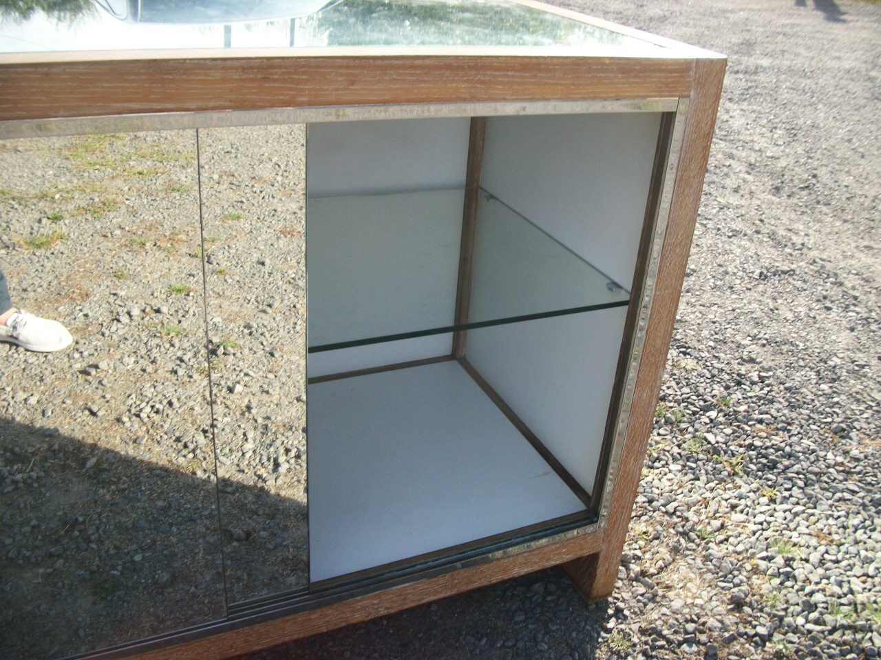 Small vintage buffet of commerce surrounded by mirrors