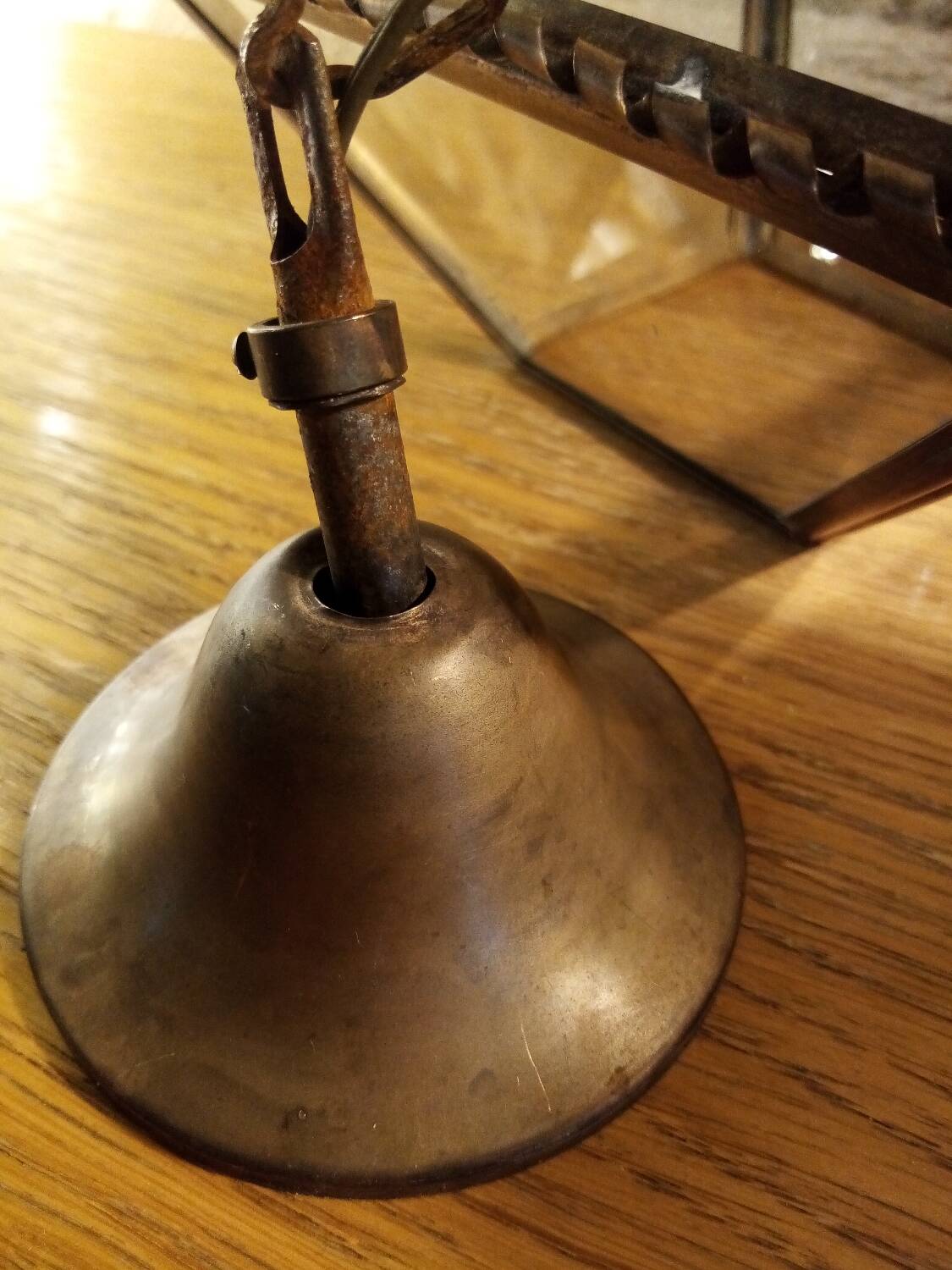 Glass and brass suspension
