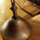 Glass and brass suspension