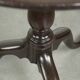 Practical round antique English tilt top table from the 18th century