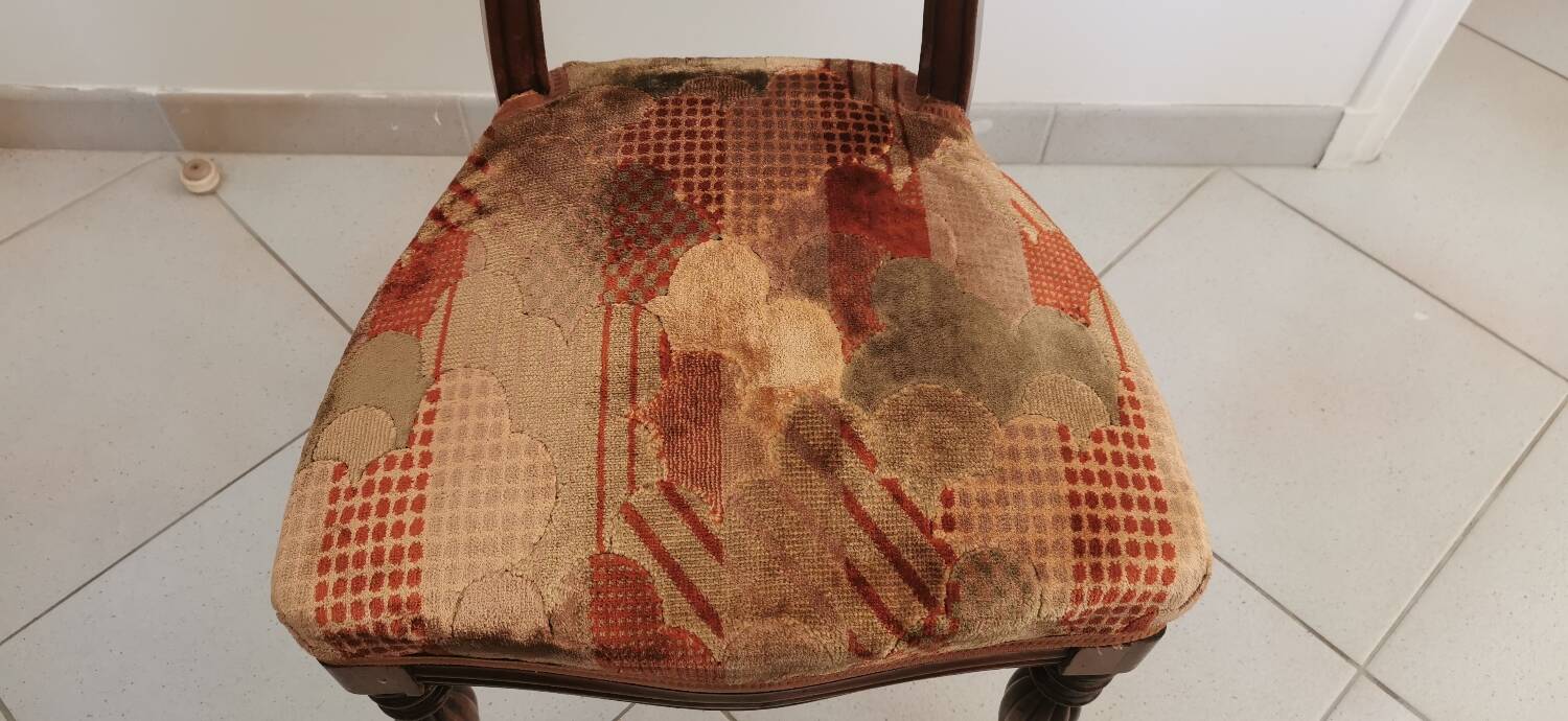 Carved wooden chair and velvet