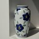 Vase white background stylized blue, yellow and green flowers H24.5 D12