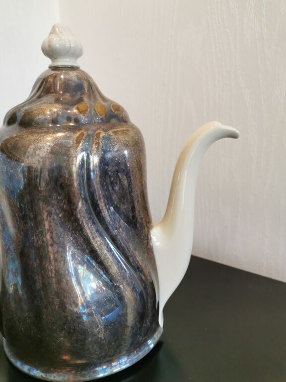 Silver-plated ceramic jug