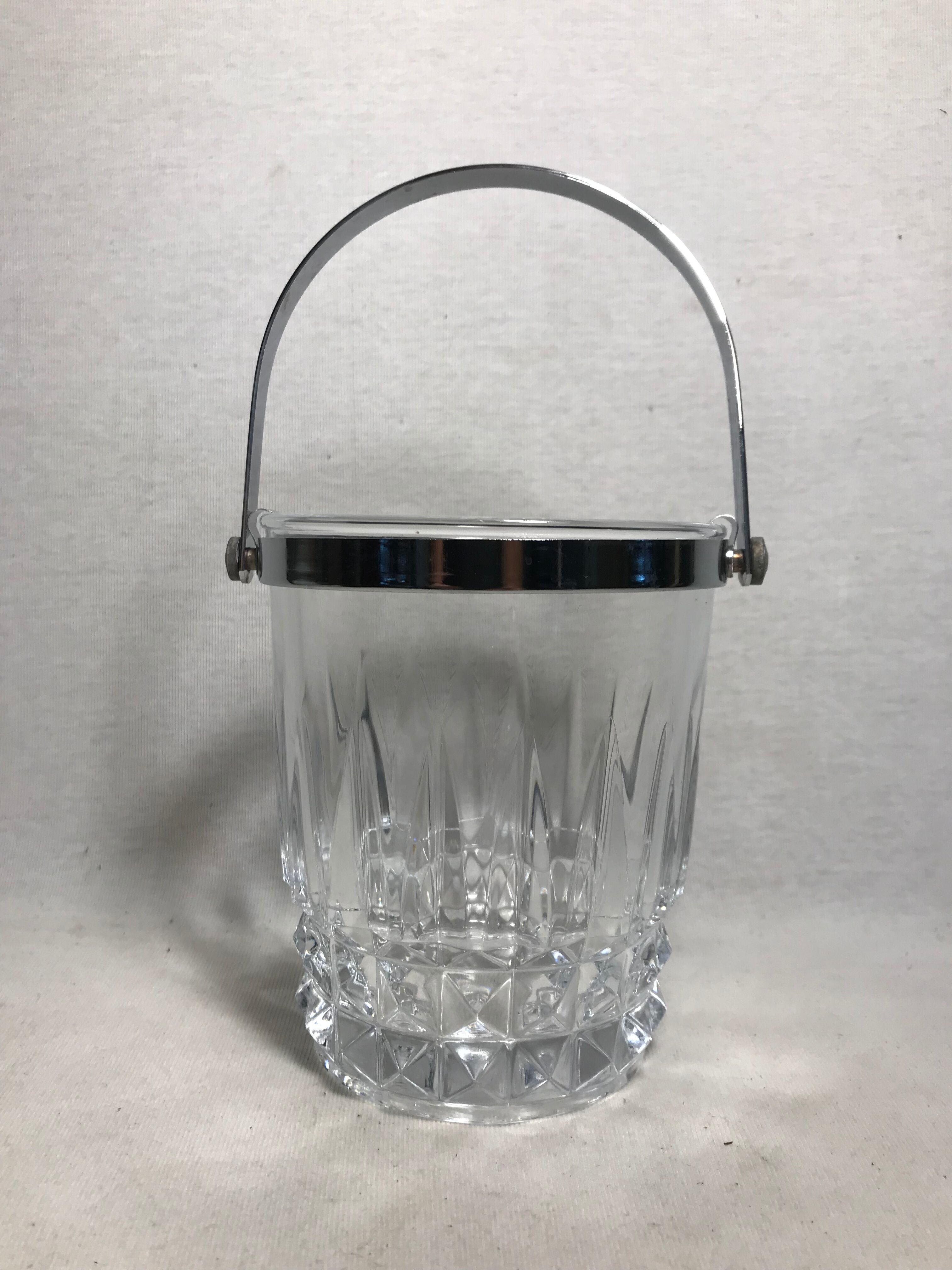 Old arched crystal ice bucket with chrome metal handle