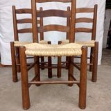 Brutalist chairs in walnut and straw