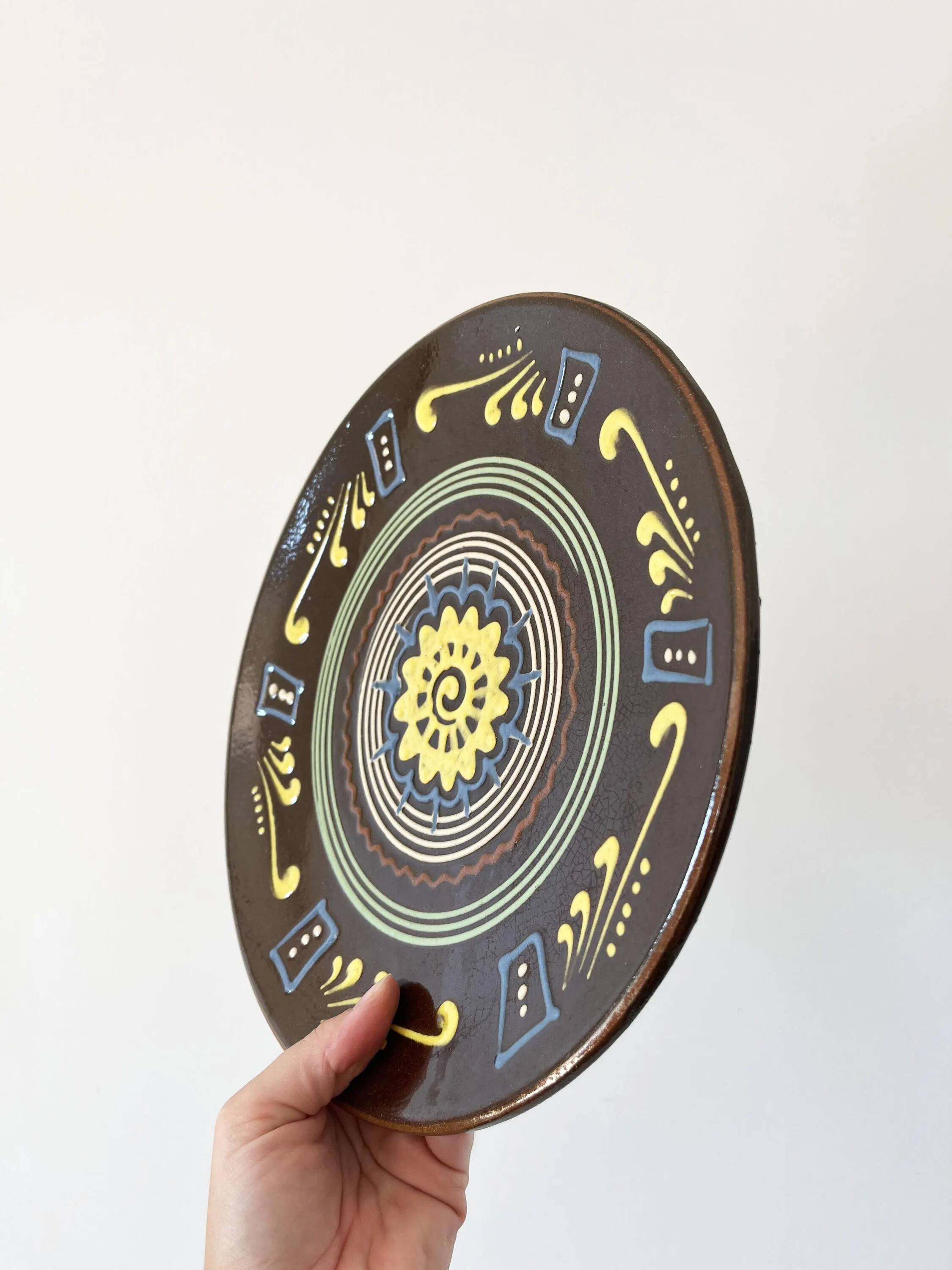 Large brown ceramic platter, 1960
