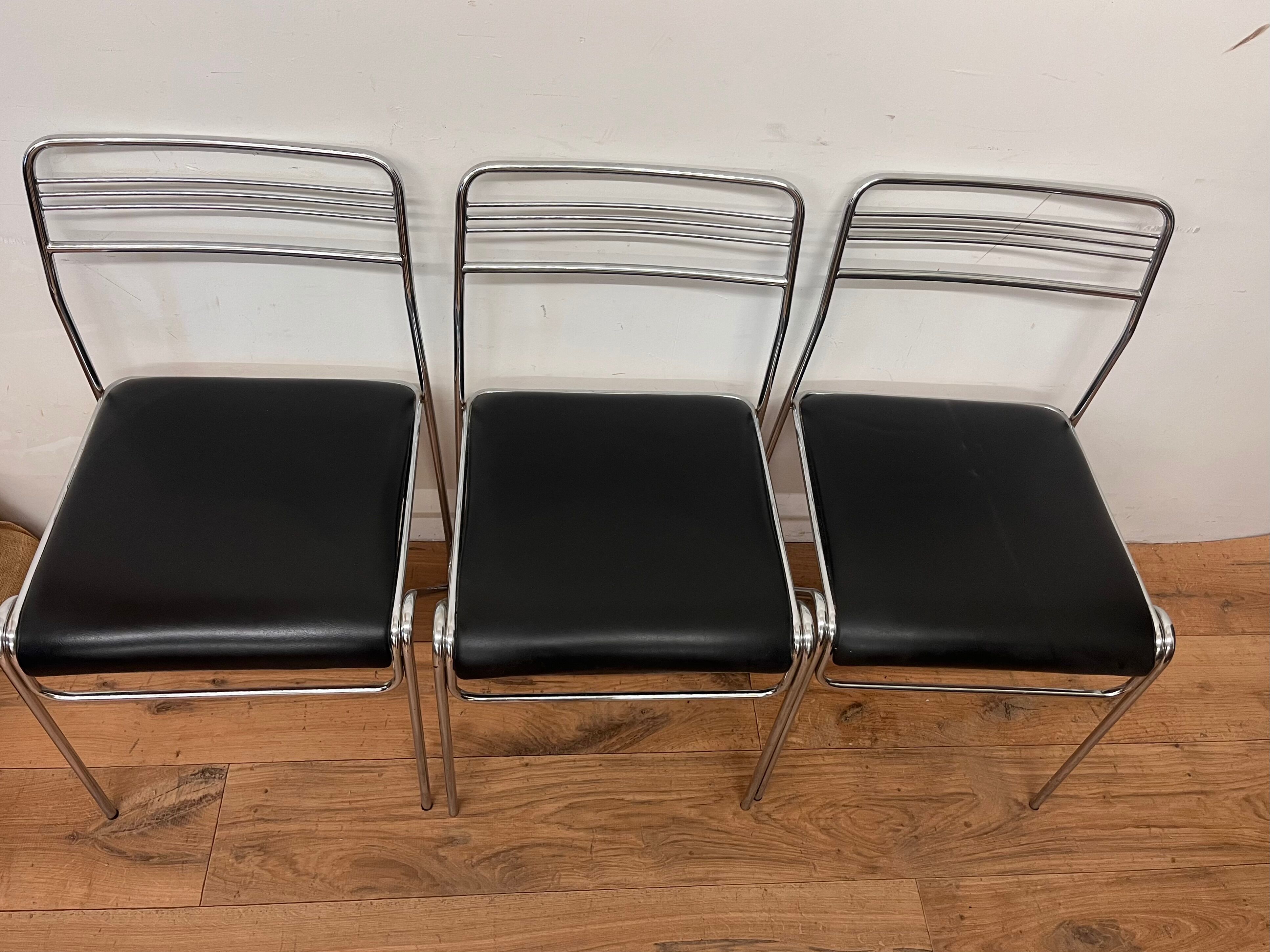 Three chrome and skai chairs from the 70s