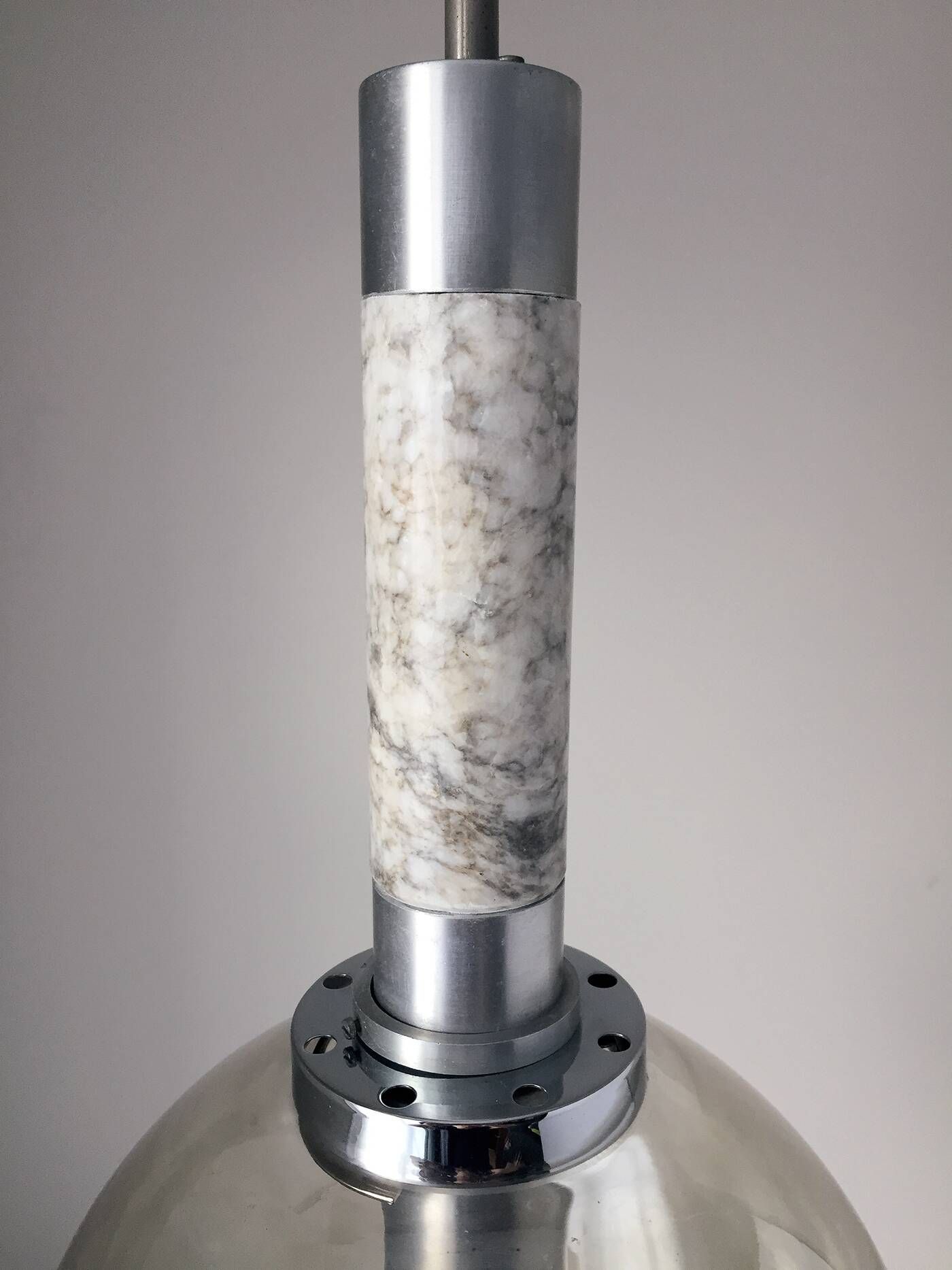 Scandinavian pendant light in brushed stainless steel marble and smoked glass globe. 1970
