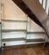 Brushed gold aluminium shelf and smoked glass from the 1970s.