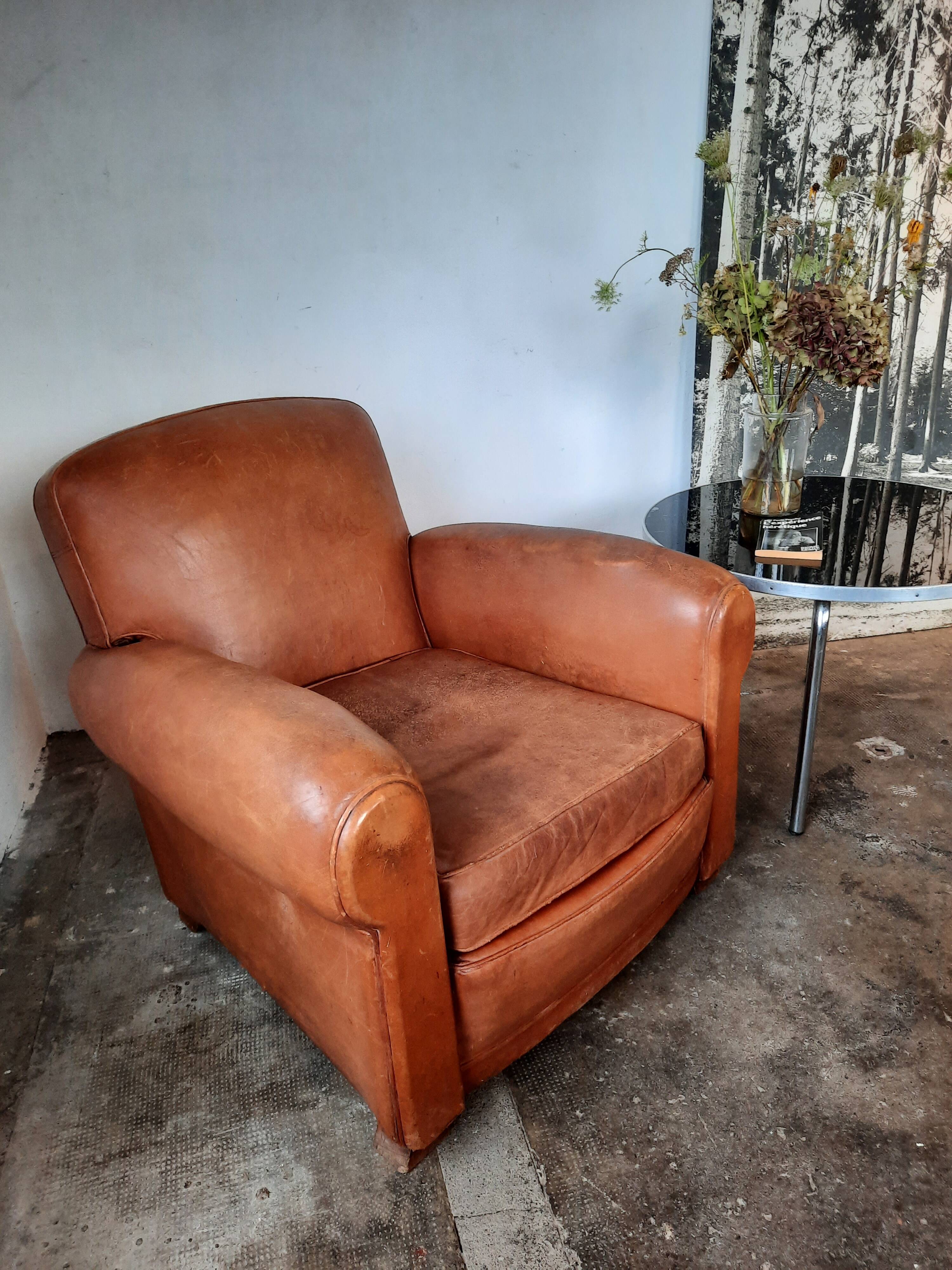 Old leather club chair 1940-1950