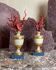 Pair of red corals on gilded and blue wooden bases