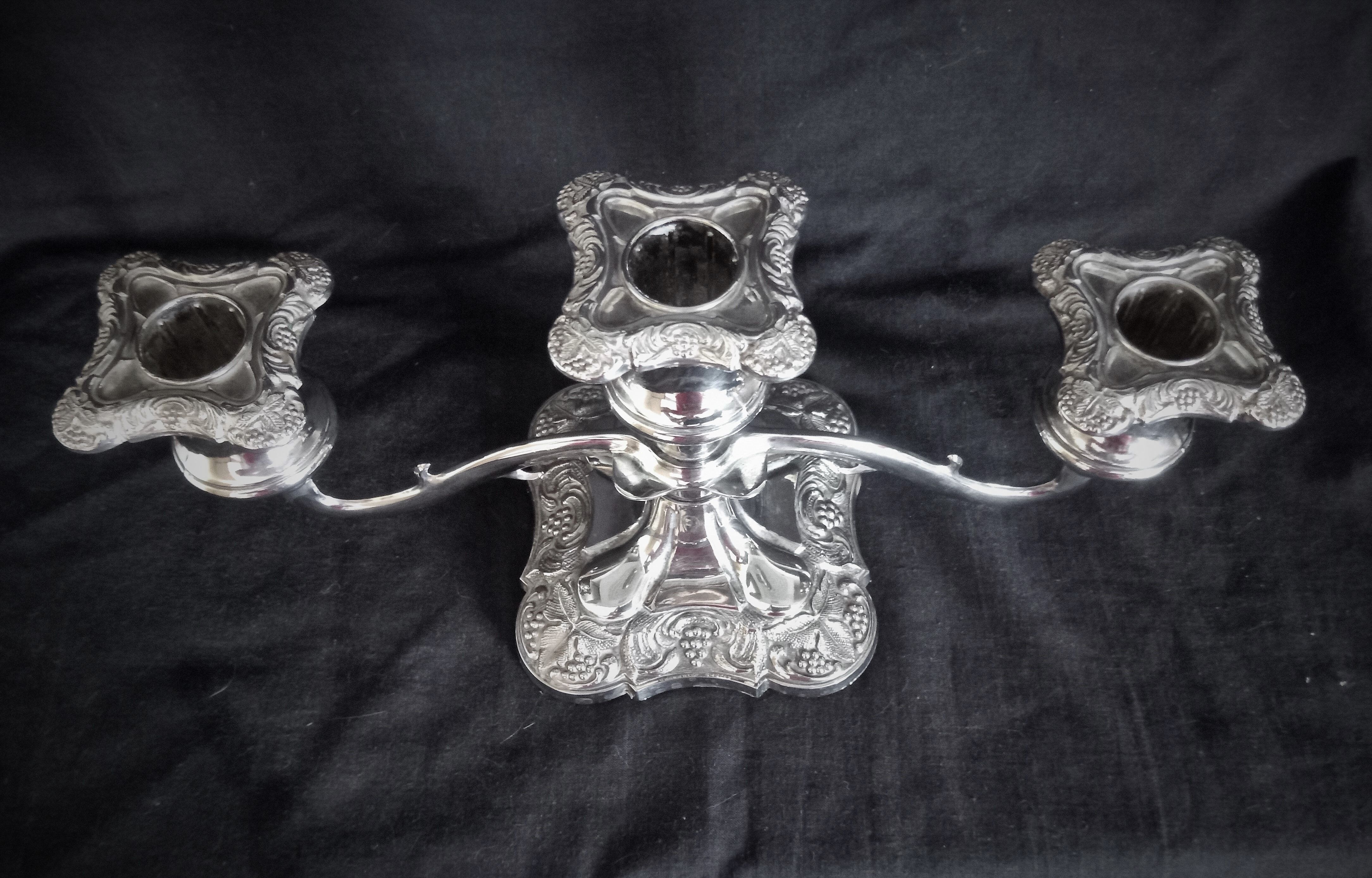 Candlestick in silver metal