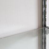 Chrome and glass wall shelf, circa 1960
