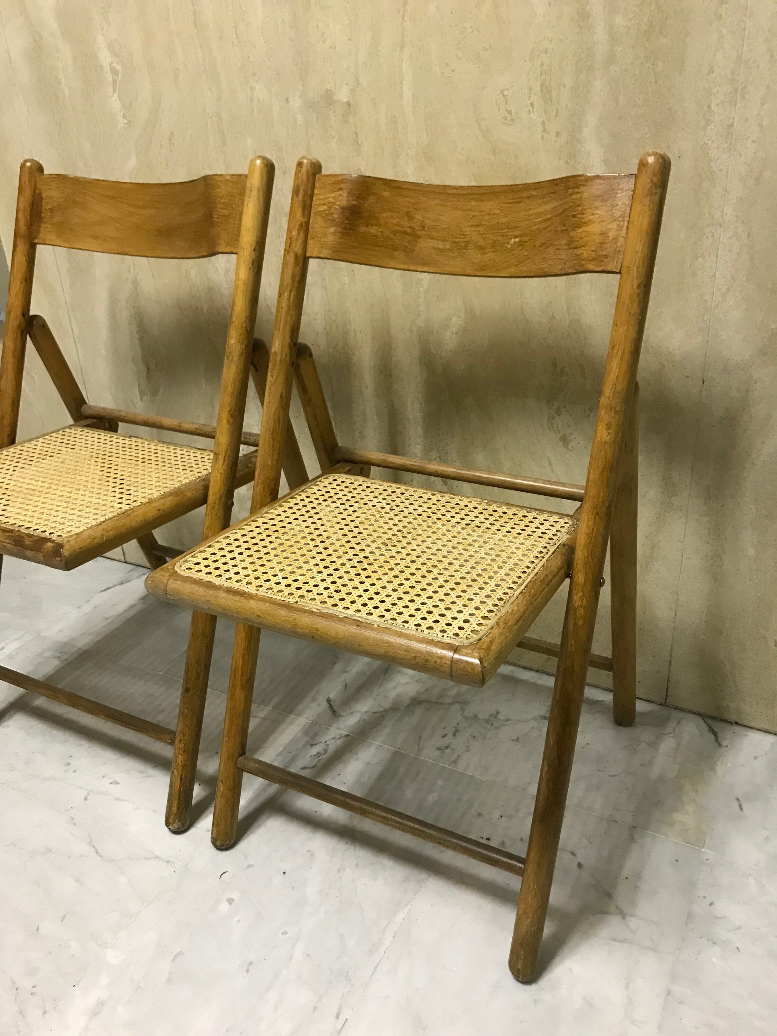 Duo of canned folding chairs