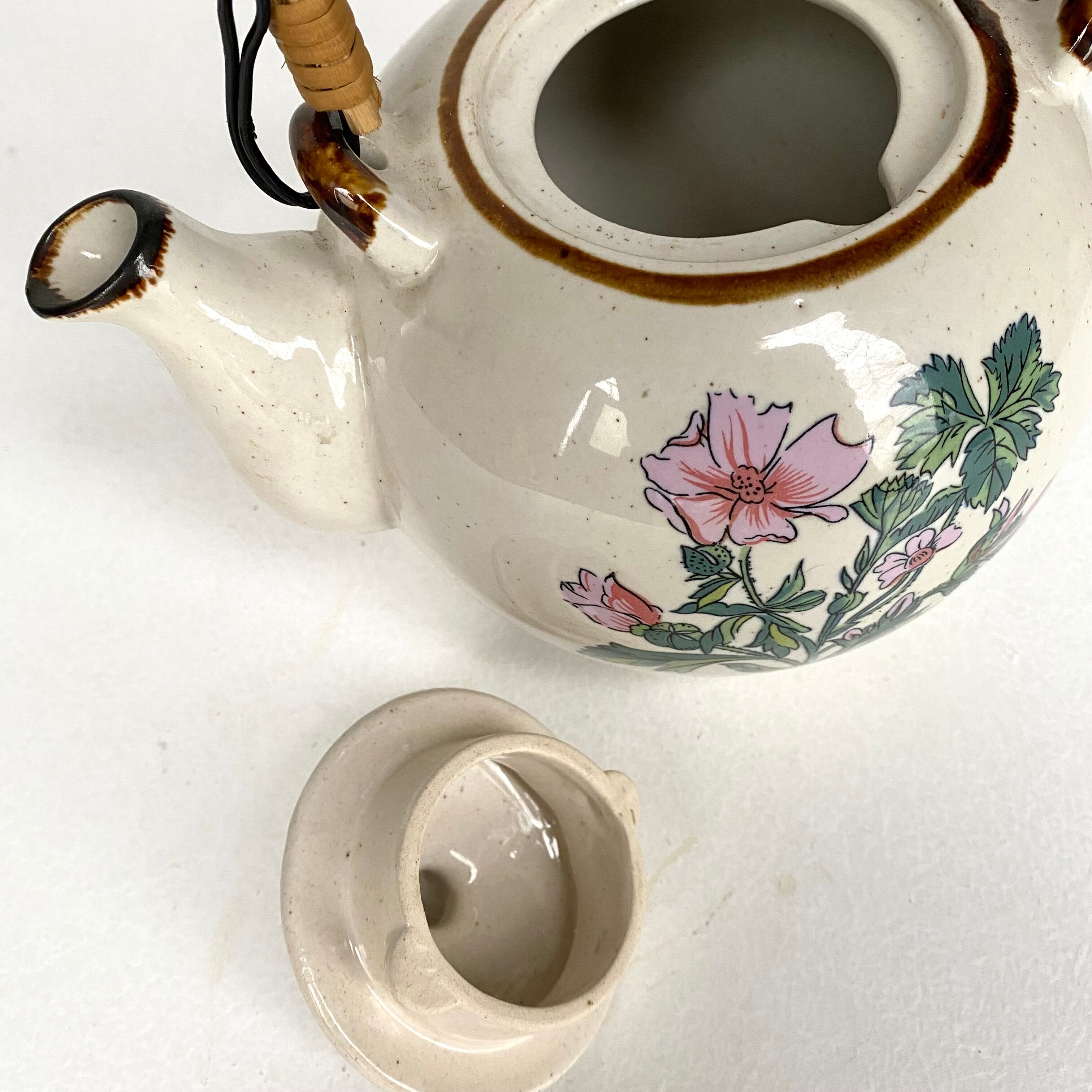 Vintage rattan teapot