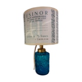 Table lamp with king blue and gold glass foot and machineinor action lampshade
