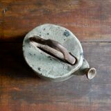 Homemade teapot in pyrity sandstone