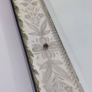 Venetian wall mirror in Murano glass with faceted floral decoration from the 1930s.