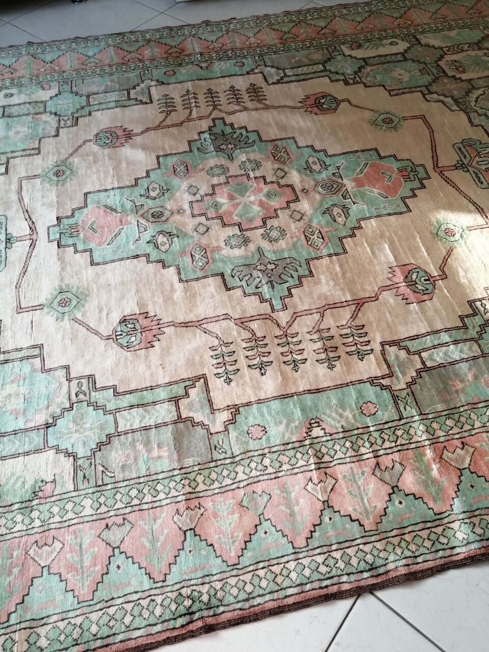 Afghan rug in pastel colors