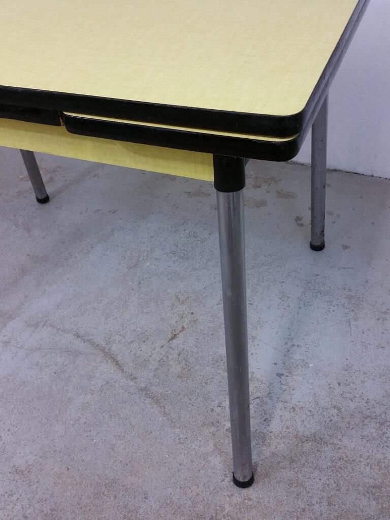 Table and chairs in formica yellow