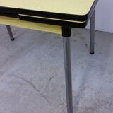 Table and chairs in formica yellow
