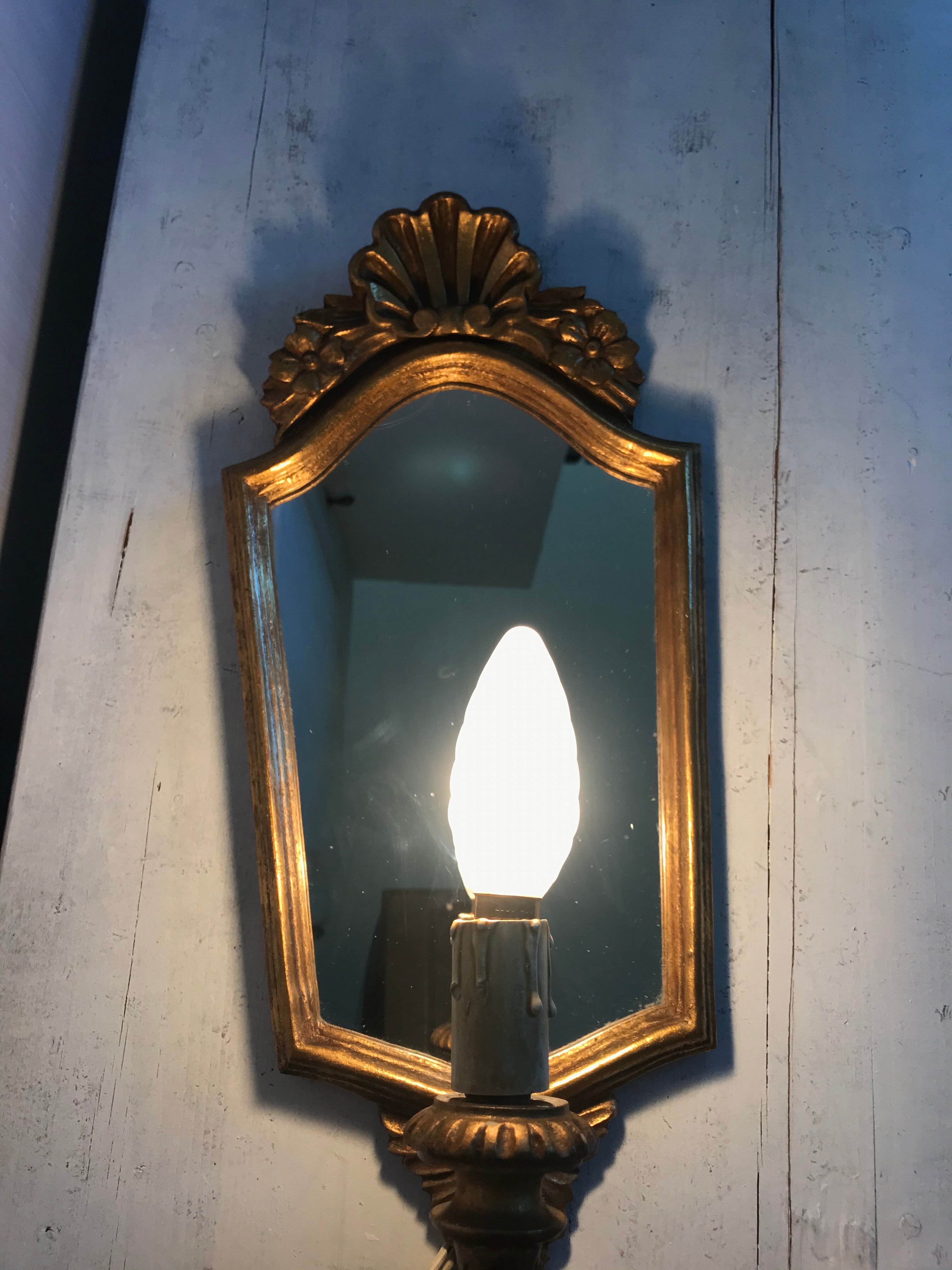 Pair of florentine wall lamps
