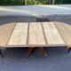 Round extendable dining table Napoleon III renovated in 19th-century oak.