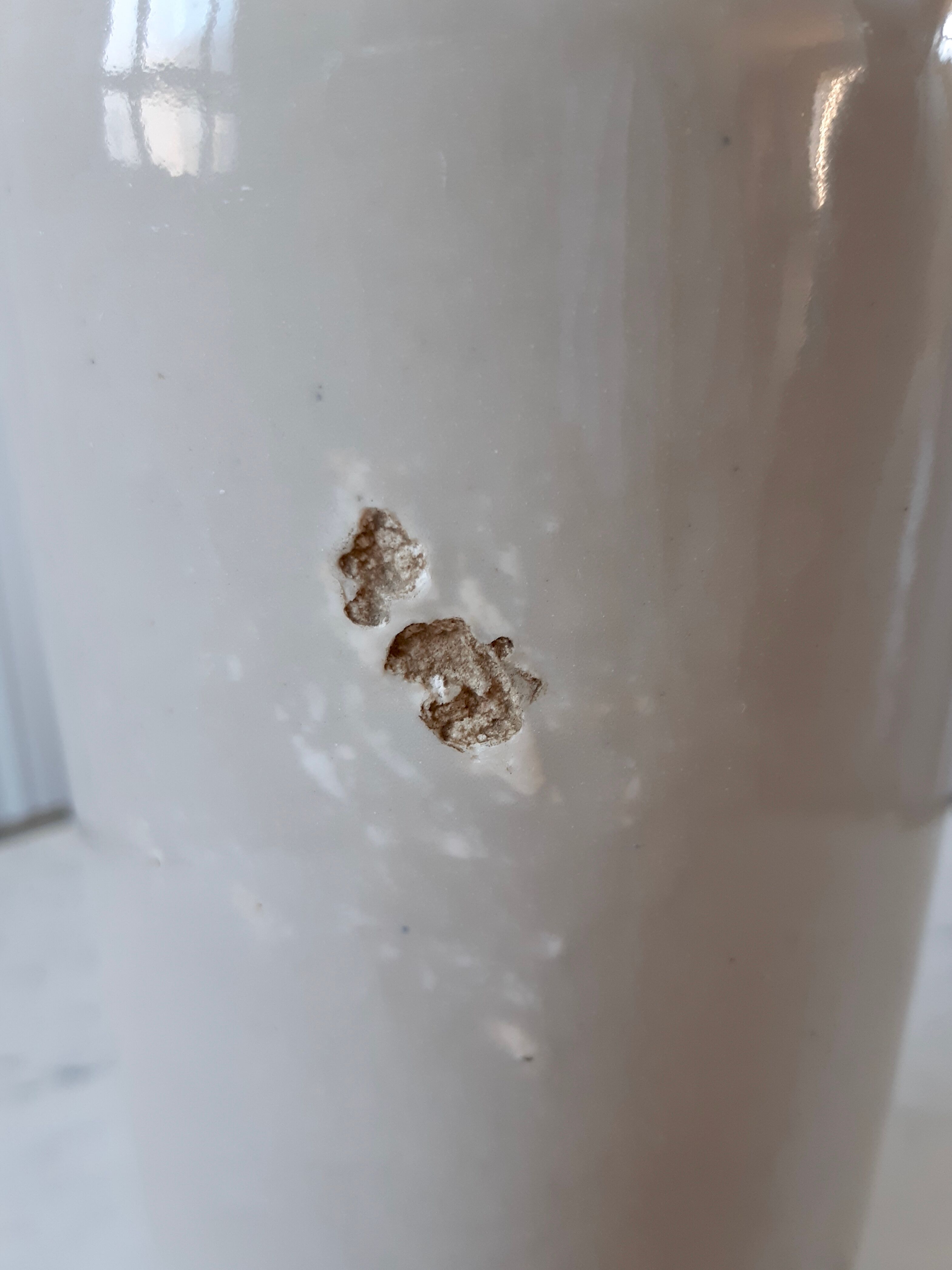 70s beige sandstone bottle