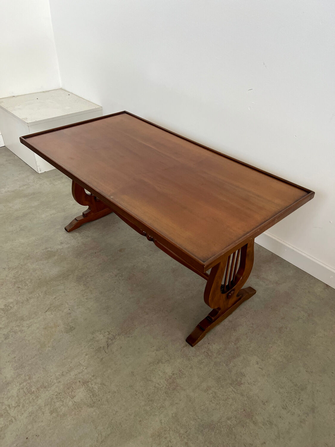 Old rectangular wood coffee table with lyre side posts
