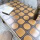 1950s rattan table with ceramic top