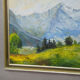 Alpine landscape painting with meadow, trees, and mountains.