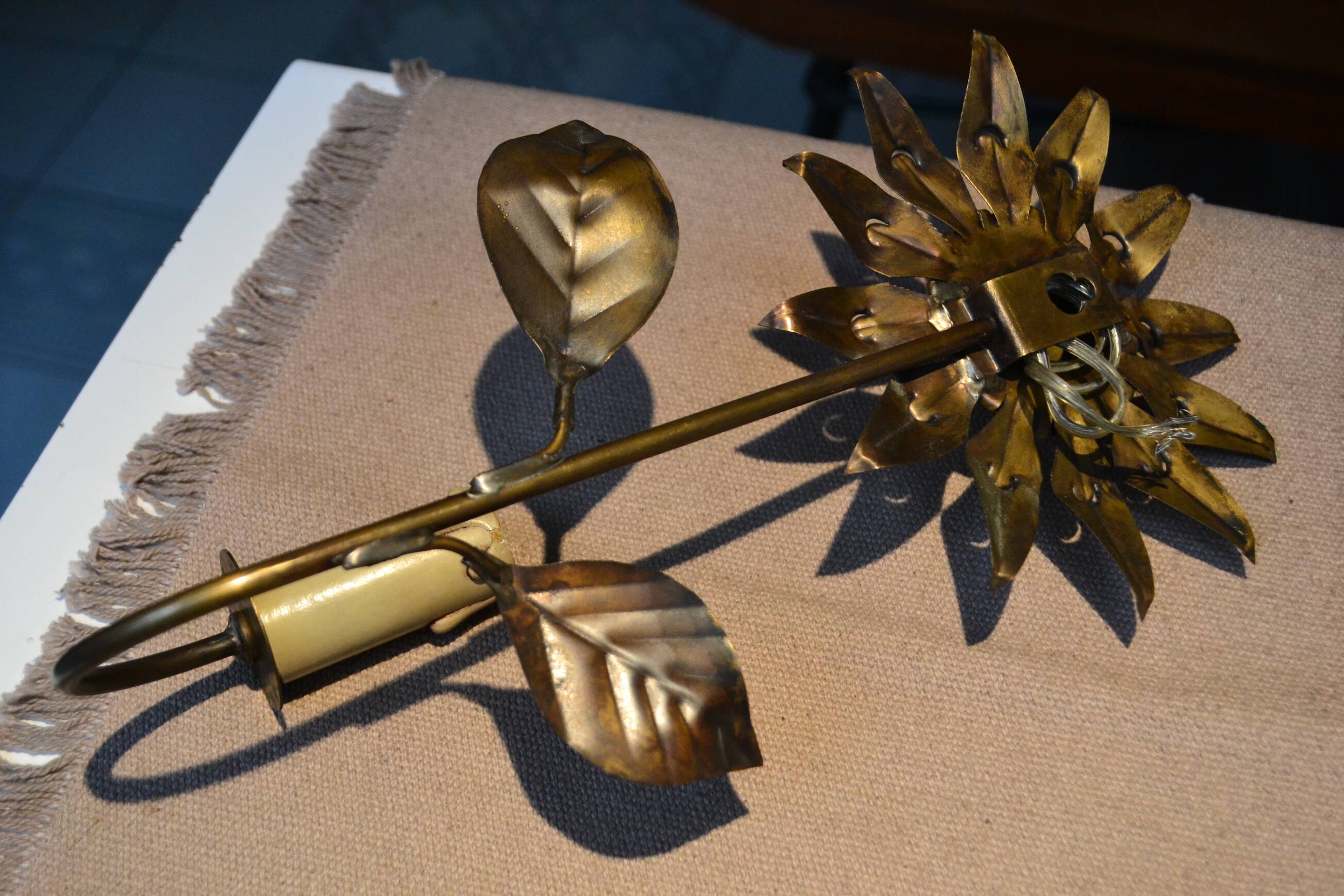 Brass flower wall light from the 1970s.