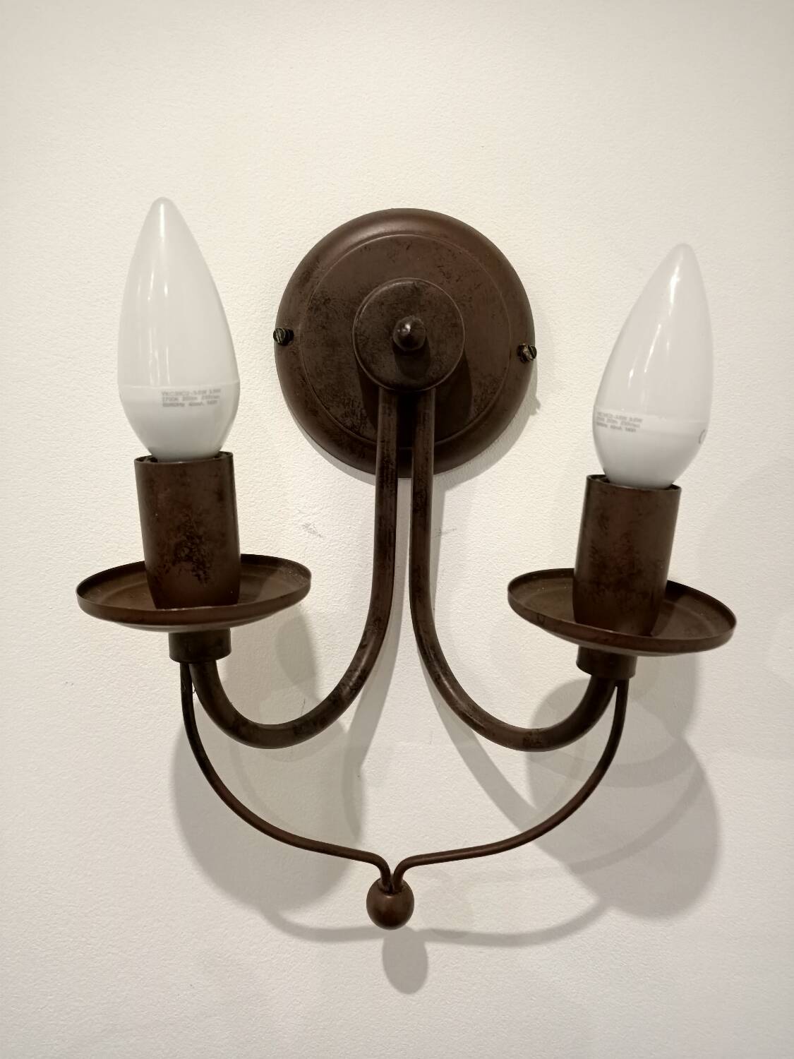 Pair of matte metal wall lights